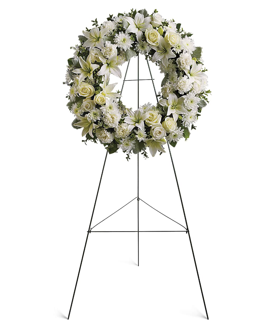Classic white flower funeral wreath displayed on an easel